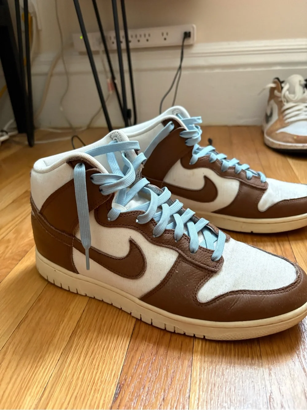 Brown and White High-Top Sneakers with Light Blue Laces